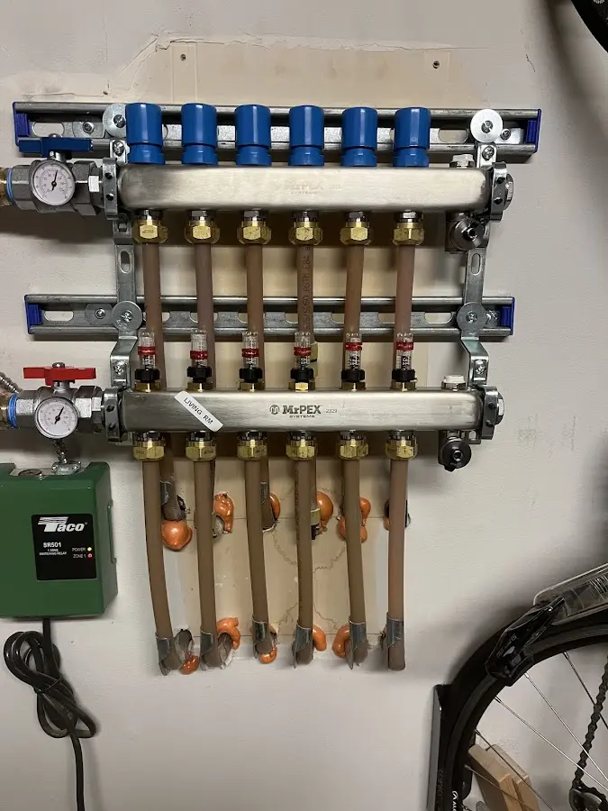 Plumber performing Water Heater Repair at a residential property in Buckhead